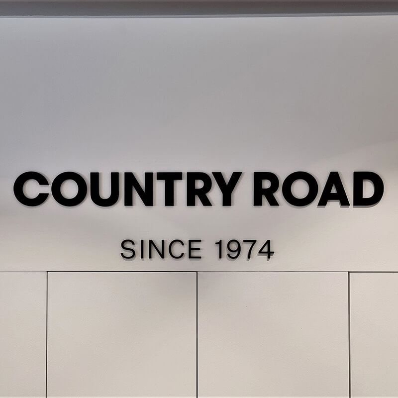 Country Road Byron Bay sign
